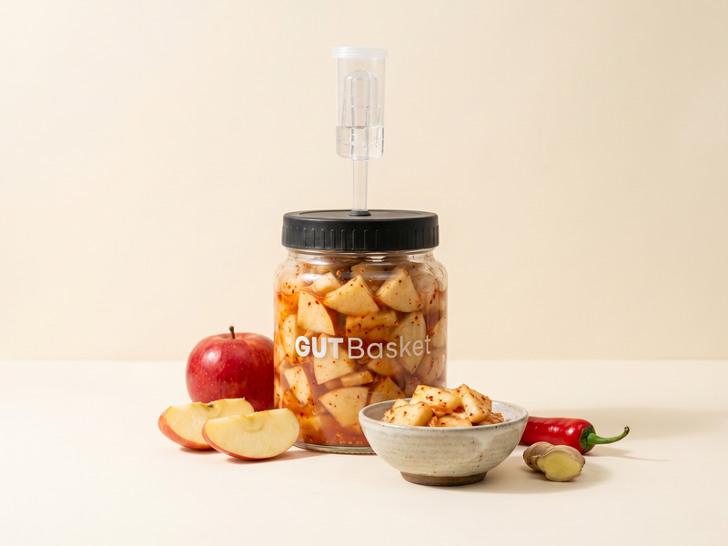 Apple Kimchi (Sagwa Kimchi) - Korean-style lacto-fermented vegetables in a jar.