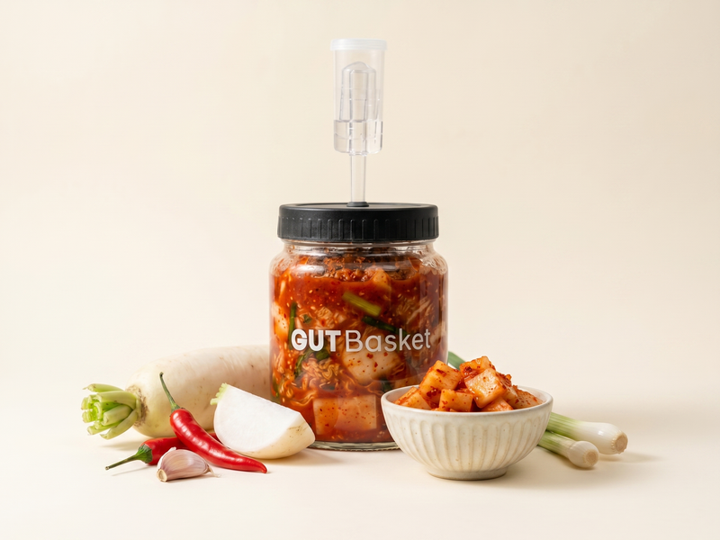 Radish Kimchi (Kkakdugi) - Korean-style lacto-fermented vegetables in a jar.