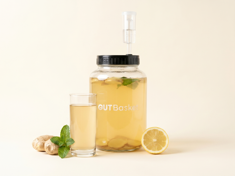 A glass of Ginger-Mint Digestive Tonic, a probiotic fermented drink.