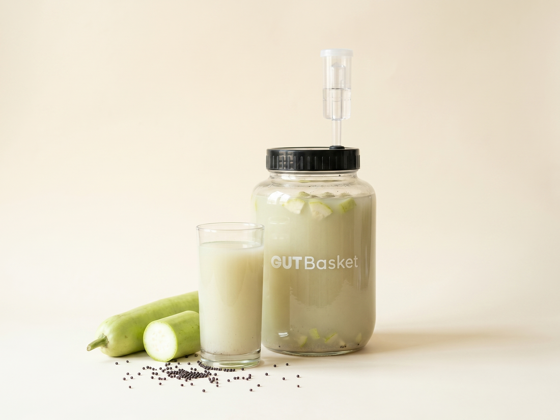 A jar of Lauki Kanji, a traditional Indian lacto-fermented probiotic drink.